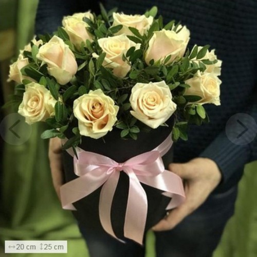 Box with white roses